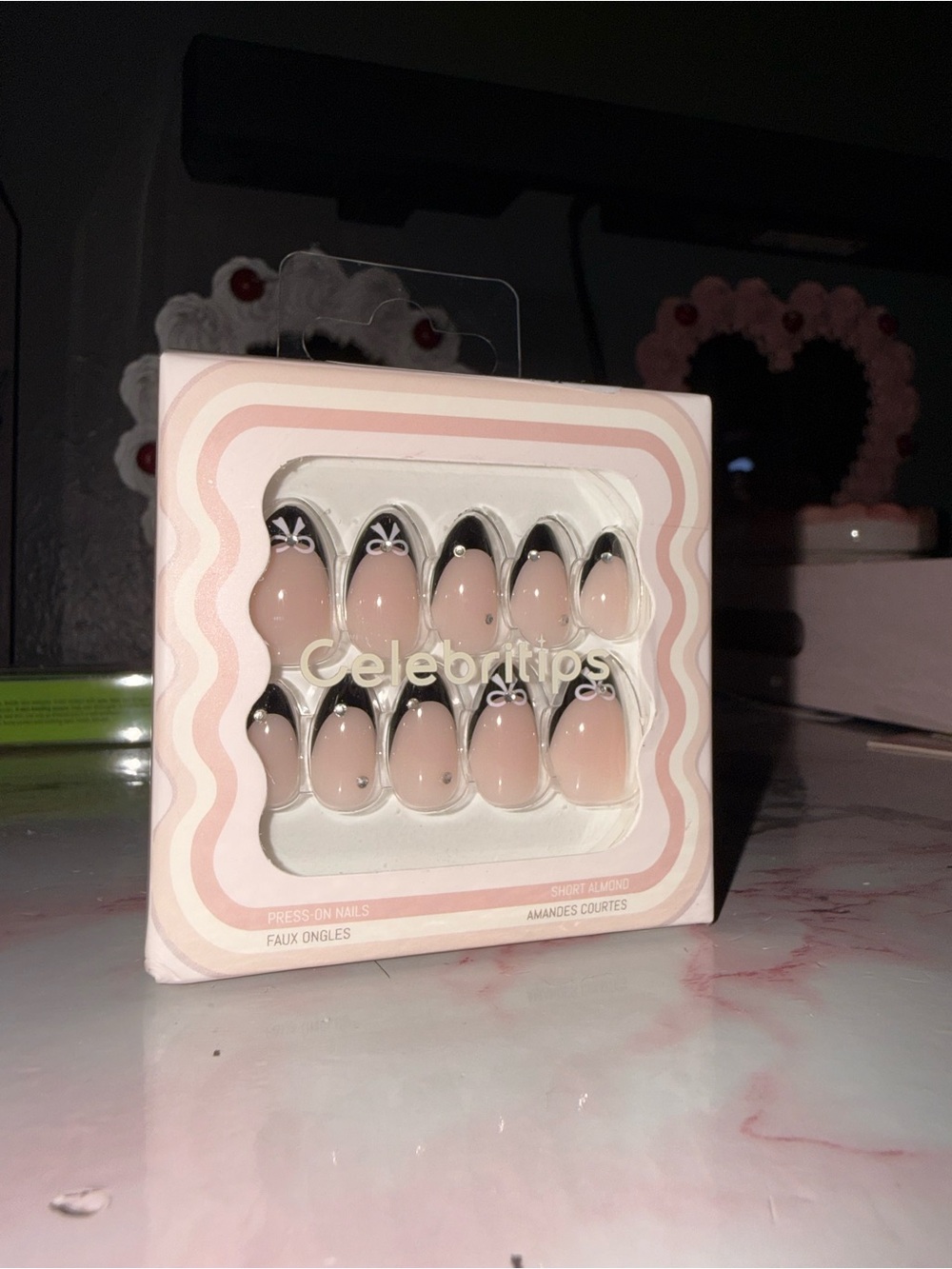 Celebritips Press-On Nails in Nude with Black French Tips & Bow Design